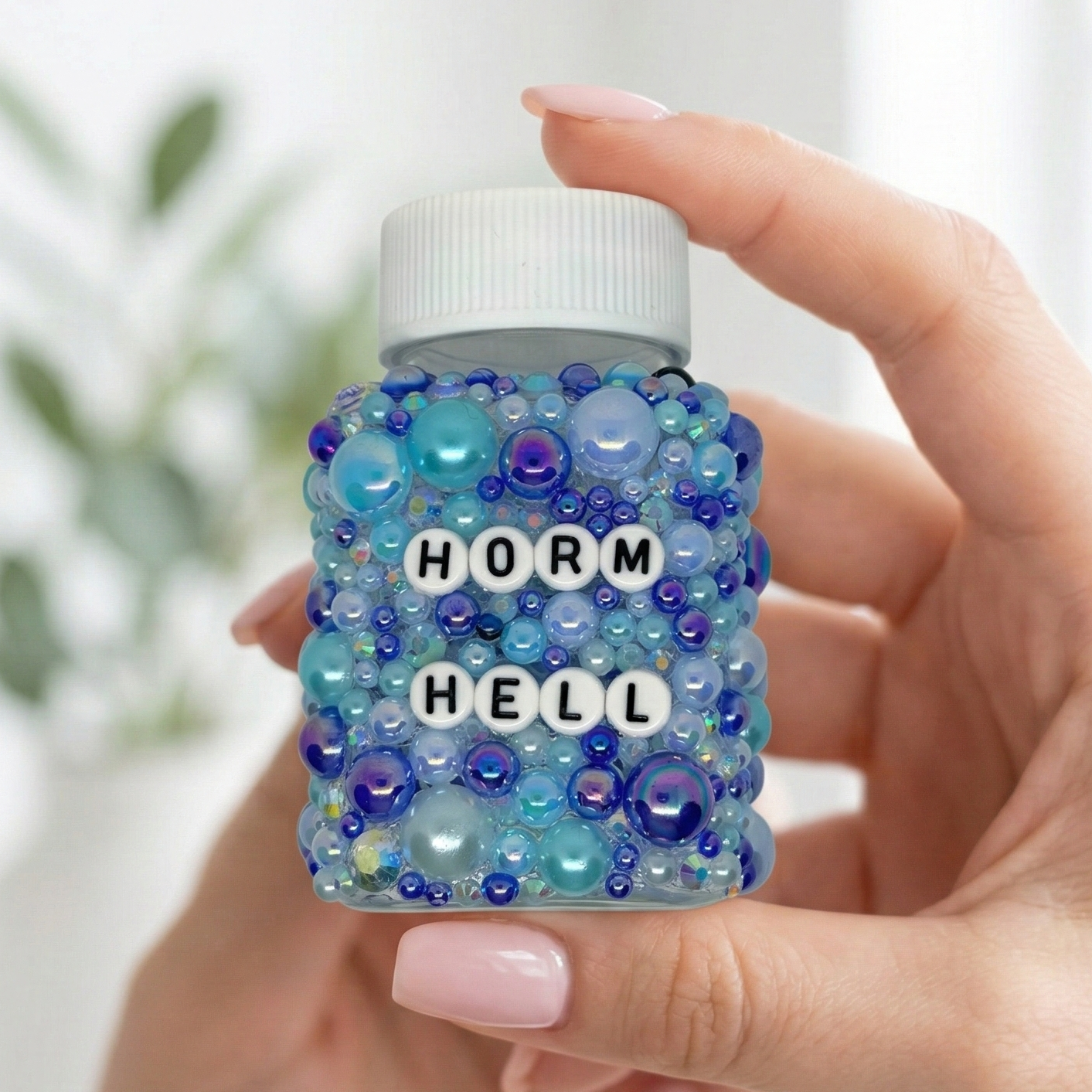 Funny hormones hormonal decorative pill bottles with sarcastic humour. Empty prescription-style containers in custom colours. A perfect mental health or chronic illness gift.