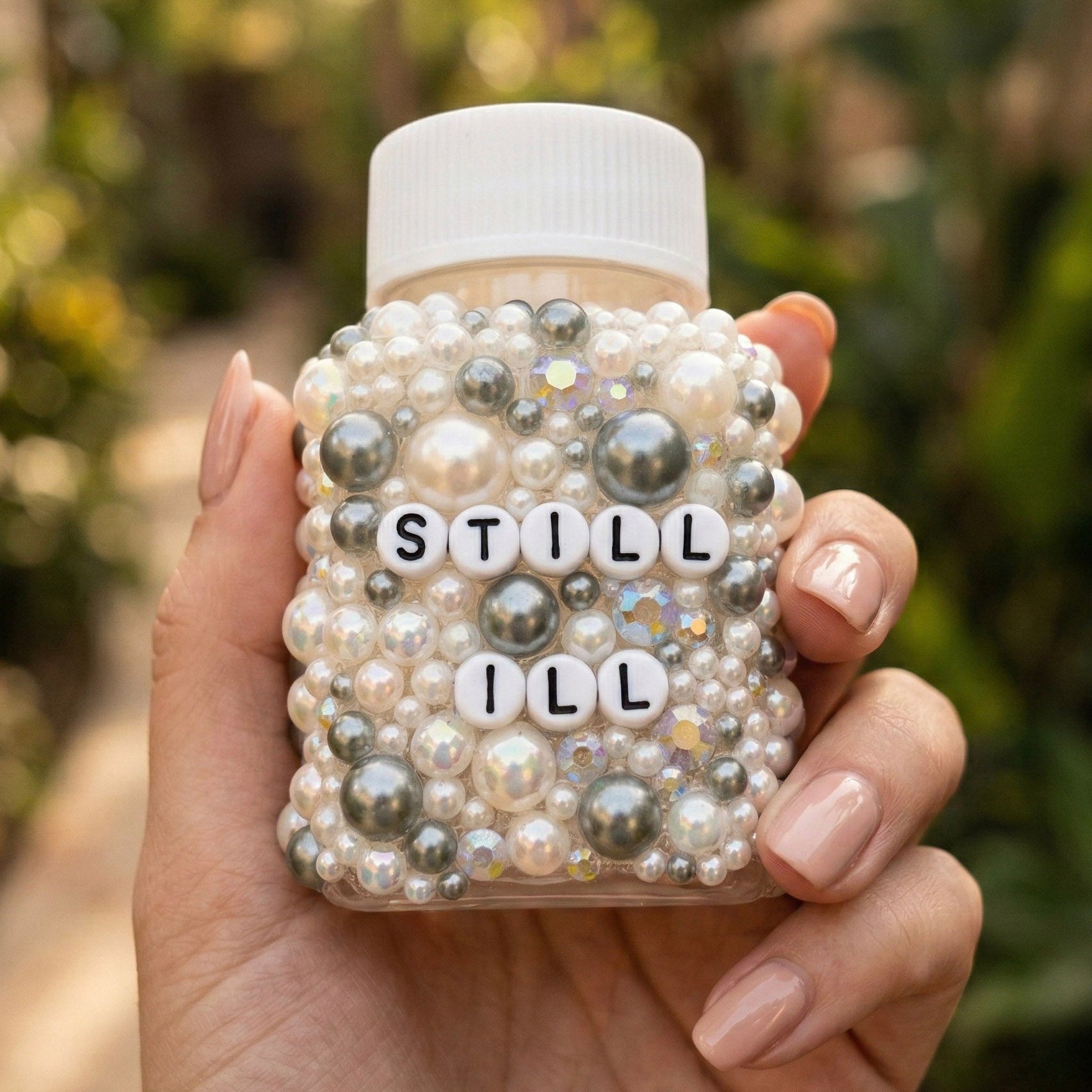 Funny ill decorative pill bottles with sarcastic humour. Empty prescription-style containers in custom colours. A perfect mental health or chronic illness gift.